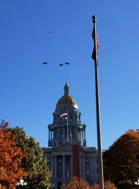 Photo showing the Fallen Hero's event with Governor Polis and jets flyover, 2021.