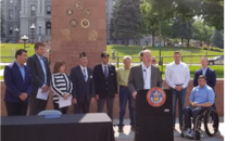 Governor Polis speaking at the bill signing for renaming park in Denver.